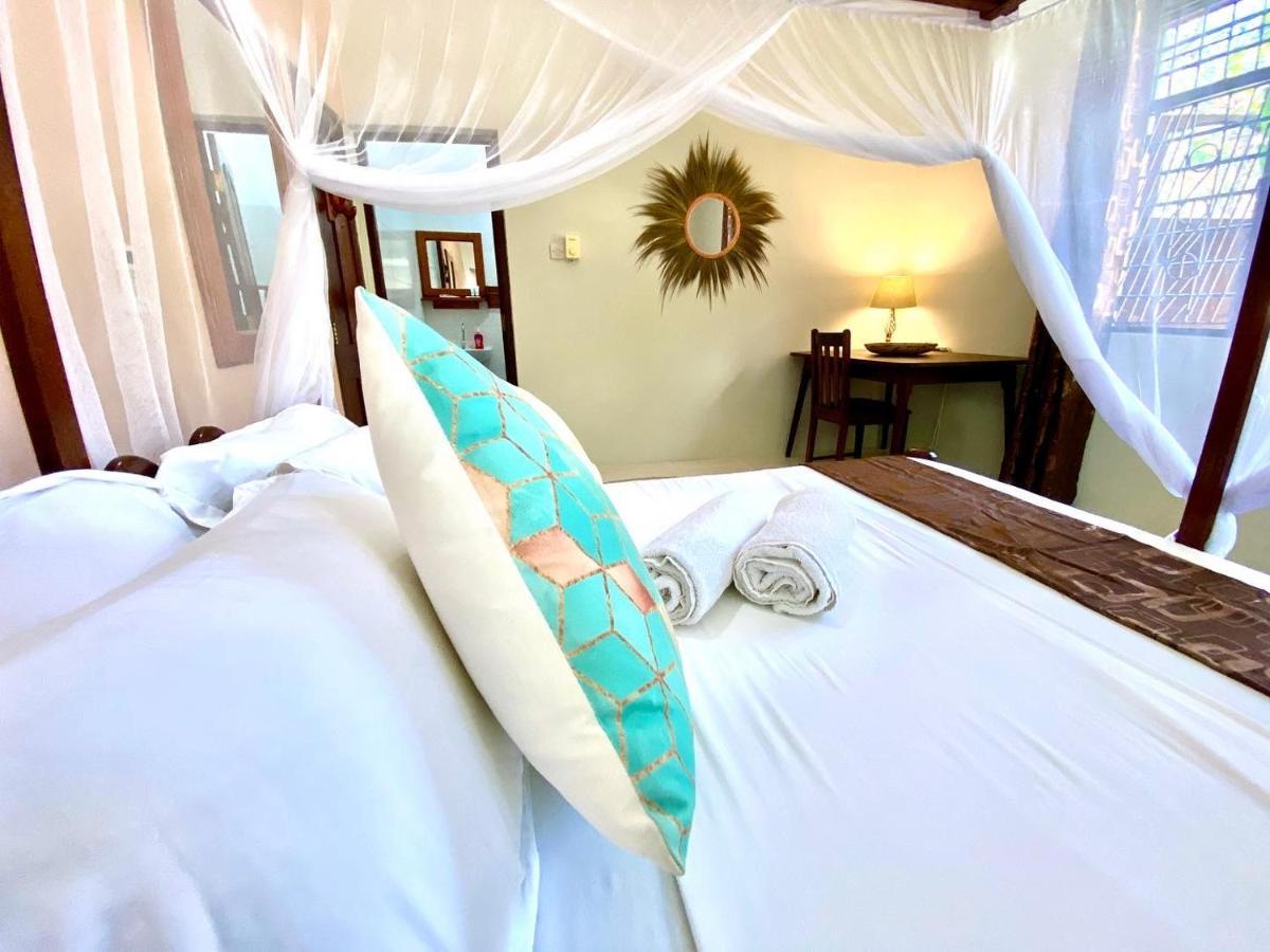 بويجو Villa Orchid Beach Guest House المظهر الخارجي الصورة